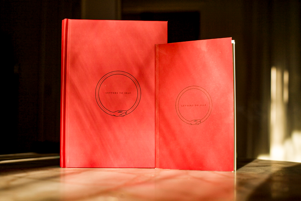 Letters To Self Hardcover and Paperback edition shown together in early morning light.